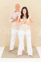 Casual business yoga pose businesspeople standing
