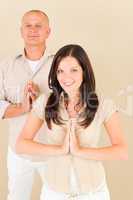 Casual business yoga pose businesspeople standing