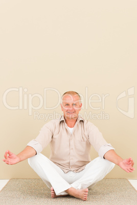 Casual business yoga smiling senior man meditate
