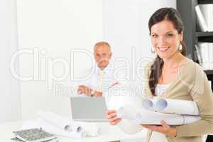 Professional architect woman with blueprint office