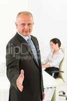 Professional senior businessman handshake office