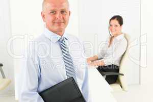 Professional senior businessman hold briefcase