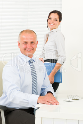 Professional senior businessman woman assistant