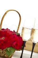Basket with roses and champagne