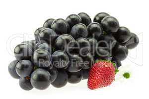 bunch of grapes and strawberries isolated on white