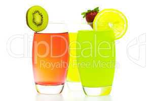 colorful cocktails with slices of fruit isolated on white