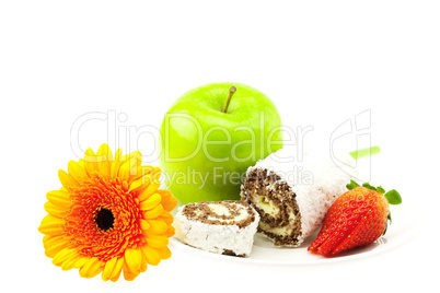 cake, strawberry, apple and flower isolated on white