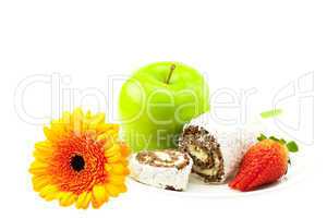 cake, strawberry, apple and flower isolated on white
