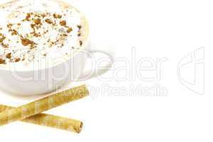 cappuccino with wafer rolls isolated on white