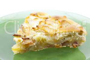 piece of apple pie is isolated on white