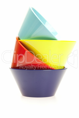 colored cups isolated on white