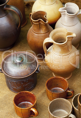 earthenware jars standing on linen rag