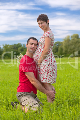 Husband taking care of his pregnant wife