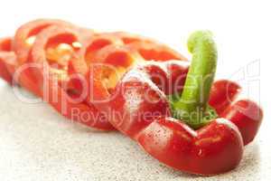 chopped red bell pepper isolated on white
