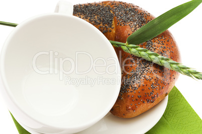 bread with poppy white cup and spike isolated on white