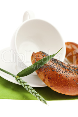 bread with poppy white cup and spike isolated on white