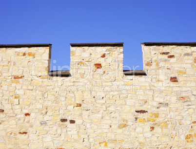 Fortress wall against the blue sky