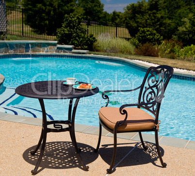 Breakfast by the pool on sunny day