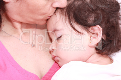 Woman with sleeping baby