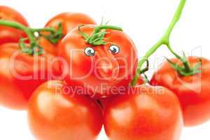 tomato with a nose and a bunch of tomato isolated on white