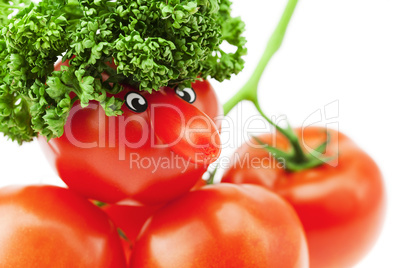 tomato with a nose and a bunch of tomatoes and herbs isolated on