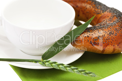 bread with poppy seeds and the spike isolated on white