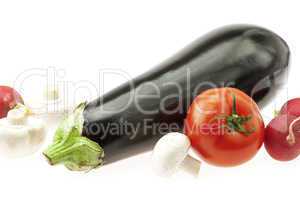 eggplant radishes tomatoes and mushrooms isolated on white