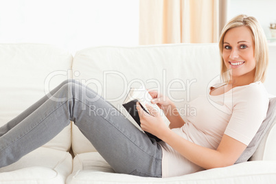 Smiling woman with a tablet computer