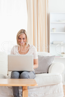 Portrait of a woman using a laptop