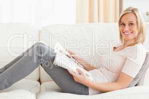 Young woman with a magazine