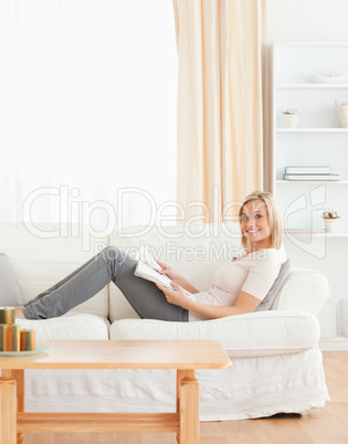 Portrait of a woman with a magazine