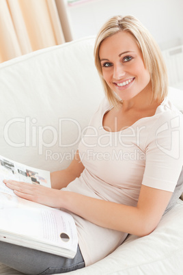 Close up of a woman with a magazine