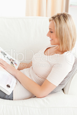 Close up of a woman reading a magazine