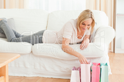 Woman looking in her shopping bags