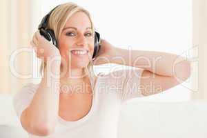 Close up of a cute woman enjoying some music