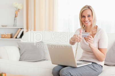 Smiling woman shopping online