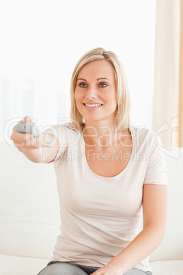 Portrait of a woman watching television