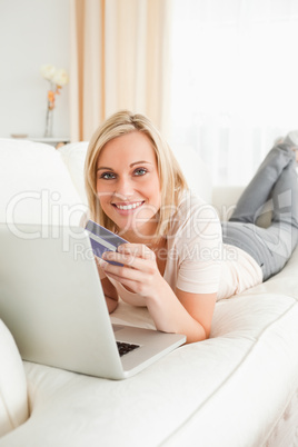 Portrait of a cute woman purchasing online