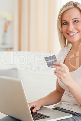 Portrait of  cute woman buying online