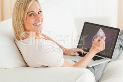 Woman paying her bills online