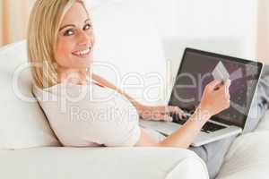 Woman paying her bills online
