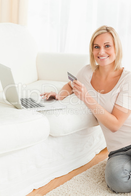 Portrait of a cute woman booking her holidays online