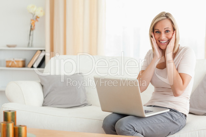 Happy woman with a laptop