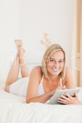 Portrait of a beautiful woman using a tablet computer