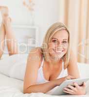 Cute woman using a tablet computer