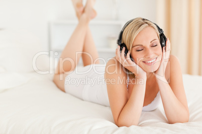 Woman listening to music with her eyes closed