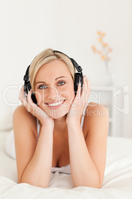Portrait of a cute woman wearing headphones