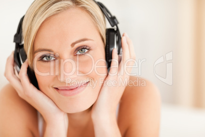 Close up of a woman wearing headphones