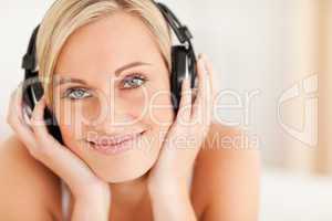 Close up of a woman wearing headphones