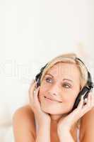 Portrait of a calm woman wearing headphones